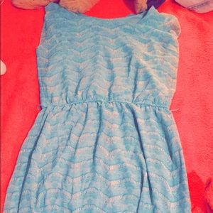 A long teal color dress